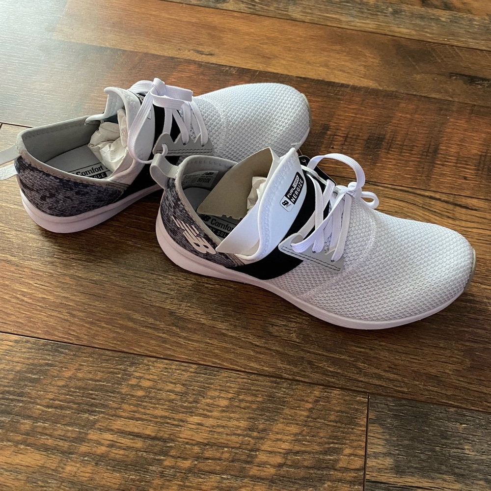 Brand new women’s New Balance snake skin sneakers. Size 7, with box. So cute